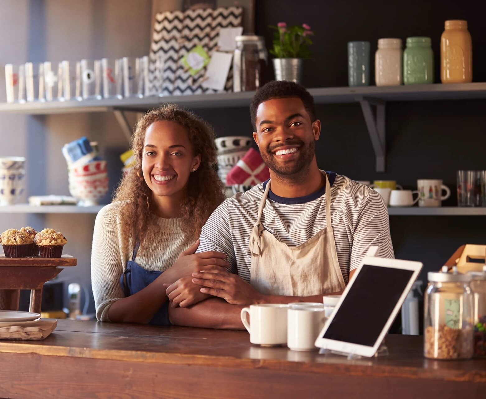 Business owner celebrating approved small business loan